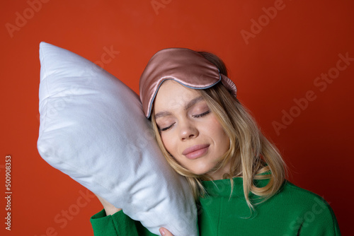 sleeping cute young caucasian woman sleeping on pillow