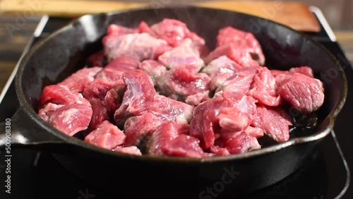 meet (beef) are fried in a frying pan