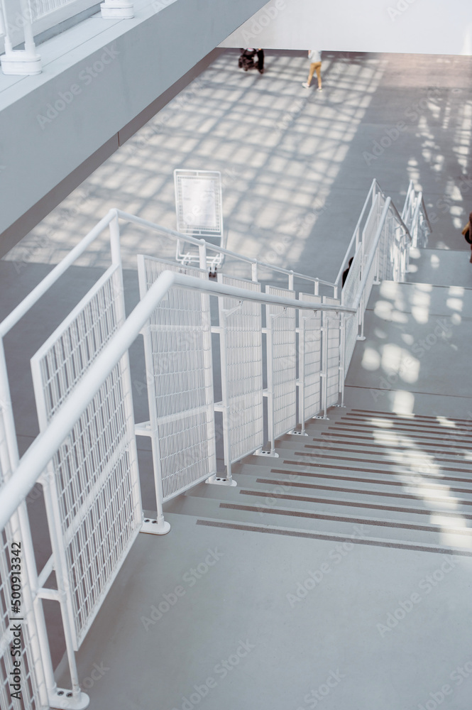 Fototapeta premium interior of a modern building white ladder, stairs