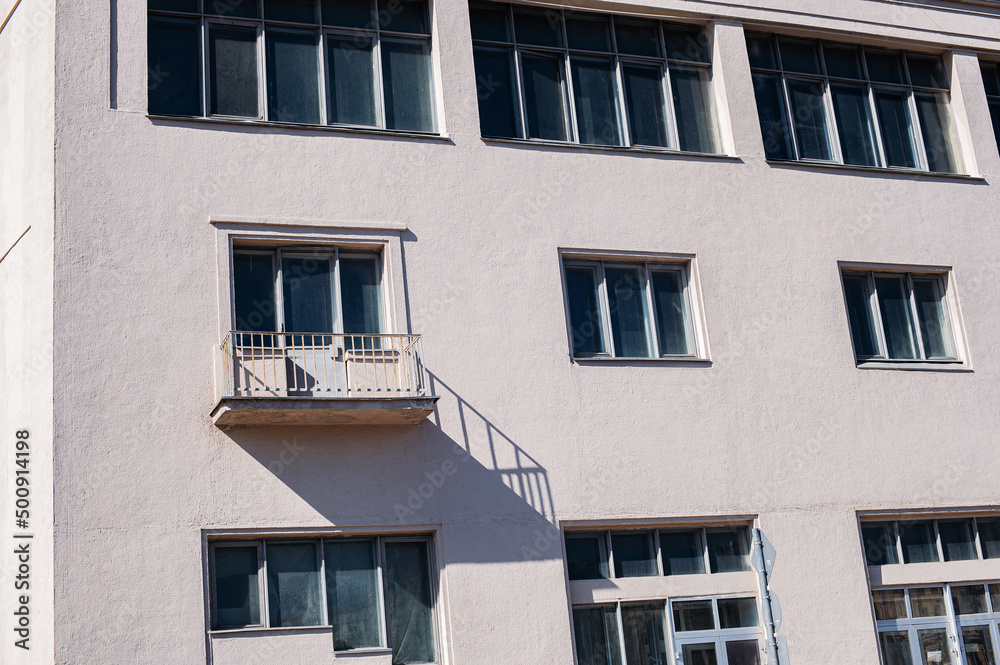 architecture facade of a white building with windows
