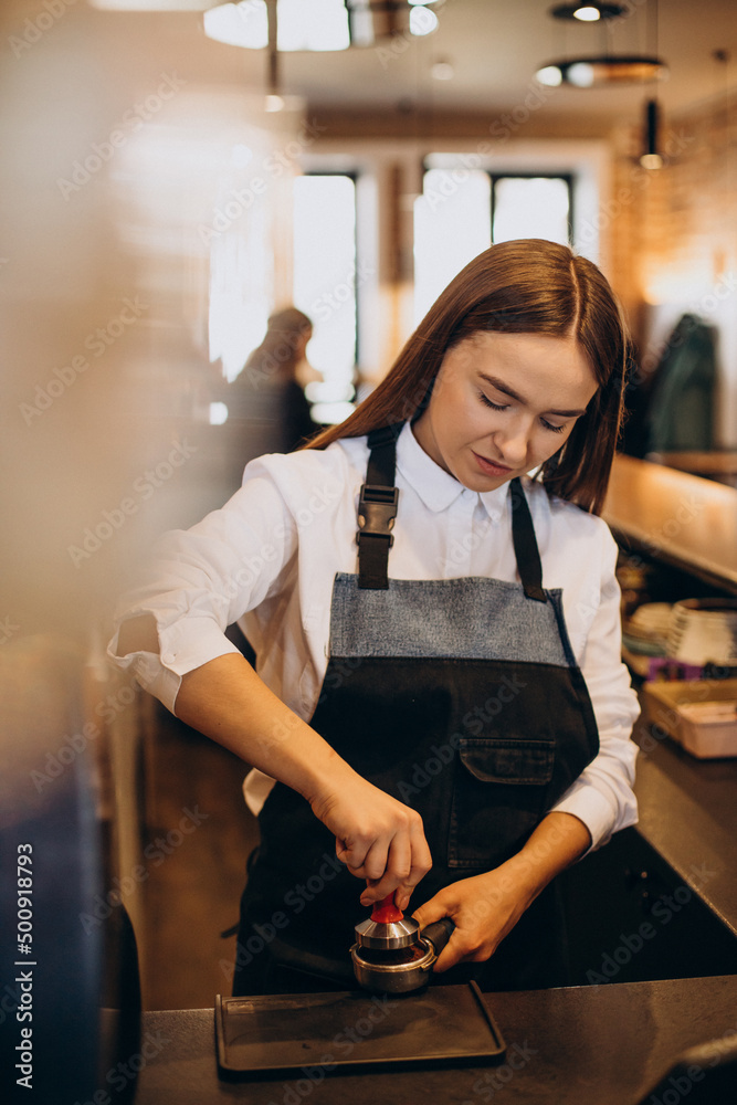 Barista preparing coffee at a coffee house