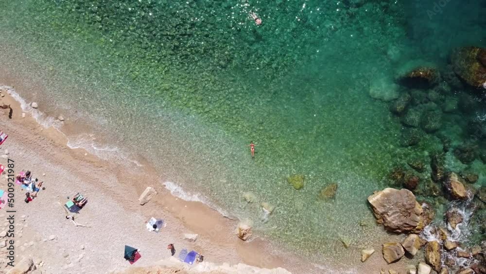 Hidden Sandy Pasjaca Beach in Dalmatia, Croatia - Aerial Top Down Ascending Hidden Sandy Pasjaca Beach in Dalmatia, Croatia - Aerial Top Down Ascending