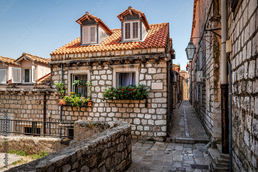Narrow city street in Dubrovnik, Dalmatia - Croatia.