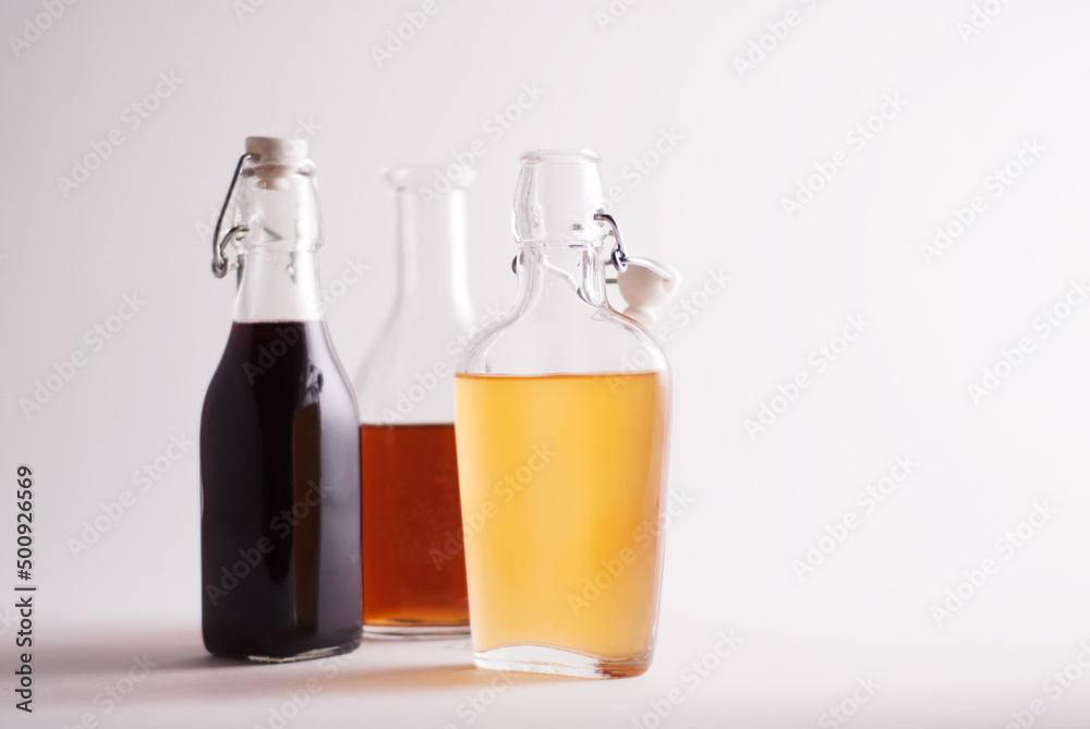 Bottle of Olive Oil with Two Bottles of Assorted Vinegar. Bottle of Olive Oil with Two Bottles of Assorted Vinegar.