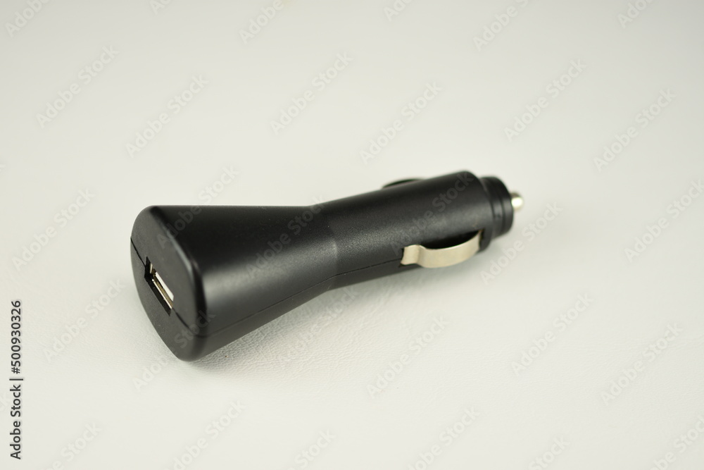 Black USB electronics device car charger isolated