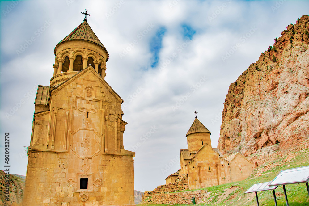 Church surrounded by red rocks. Amazing nature with unique colorful mountains and Noravank Monastery