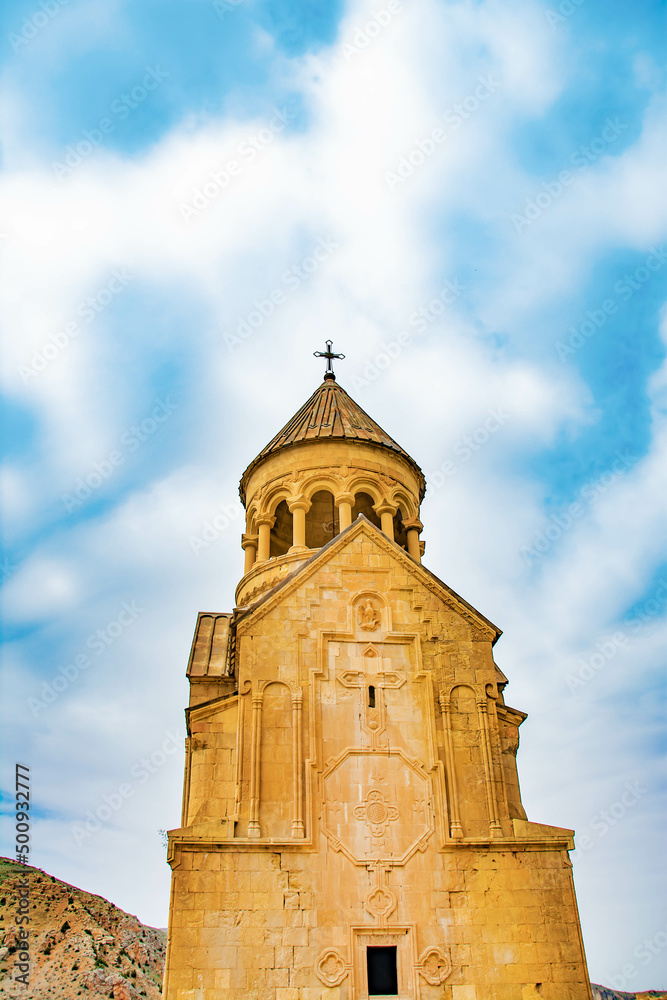 Beautiful architecture of Armenian ancient churches. Noravank monastery and blue sky