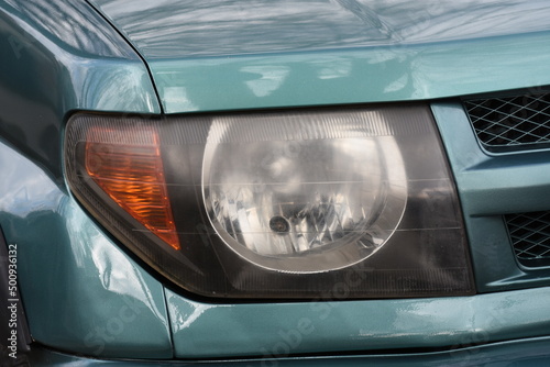  Can Stock Photo Bright shiny headlight. Bright shiny car headlight close-up. new clean led car light © Laurenx
