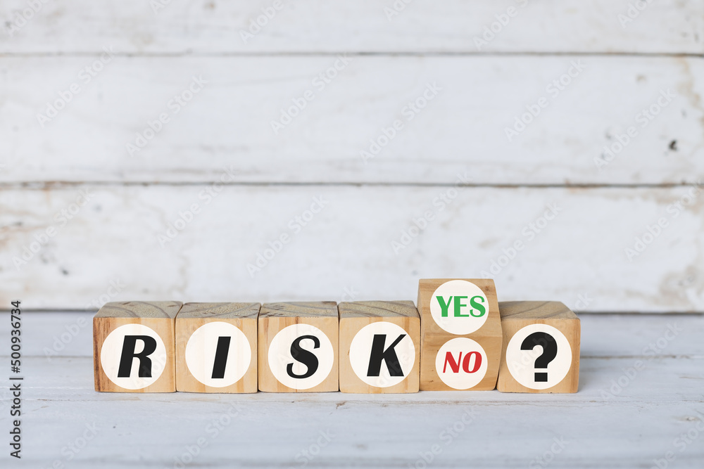 wooden blocks with the words Risk and Rise. Enterprise risk management and growth performance. Risks evaluation. wooden blocks with the words Risk and Rise. Enterprise risk management and growth performance. Risks evaluation.