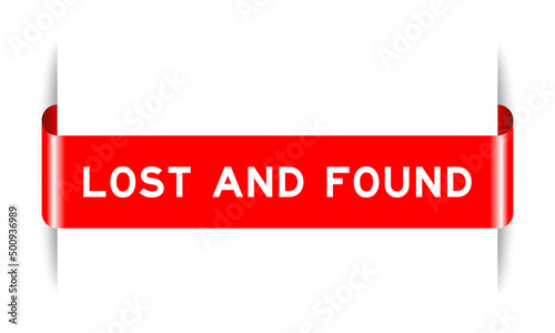 Red color inserted label banner with word lost and found on white background