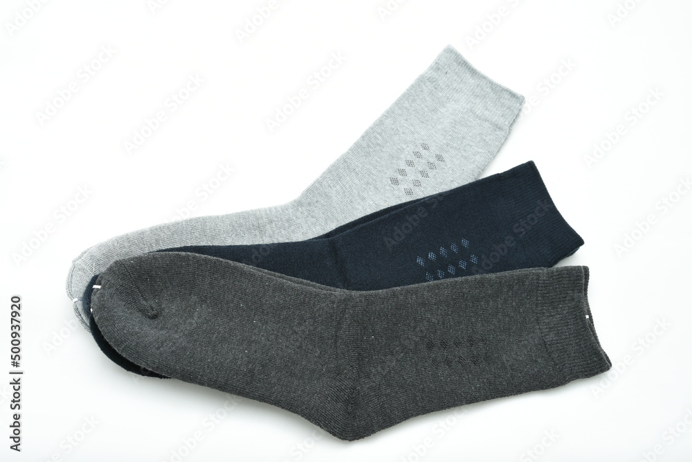 Three pair of male socks isolated on a white background Three pair of male socks isolated on a white background