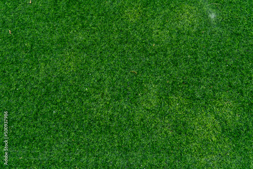 Top view artificial grass  field background texture, shot from above. abstract background.