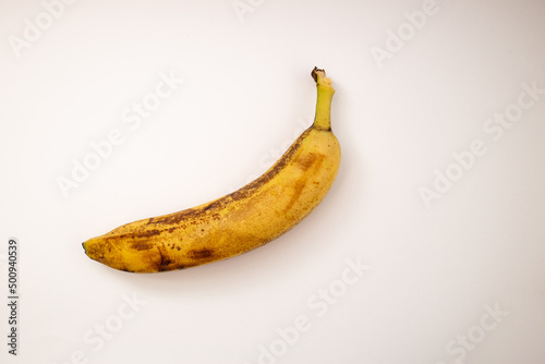 Spoiled banana on a white background