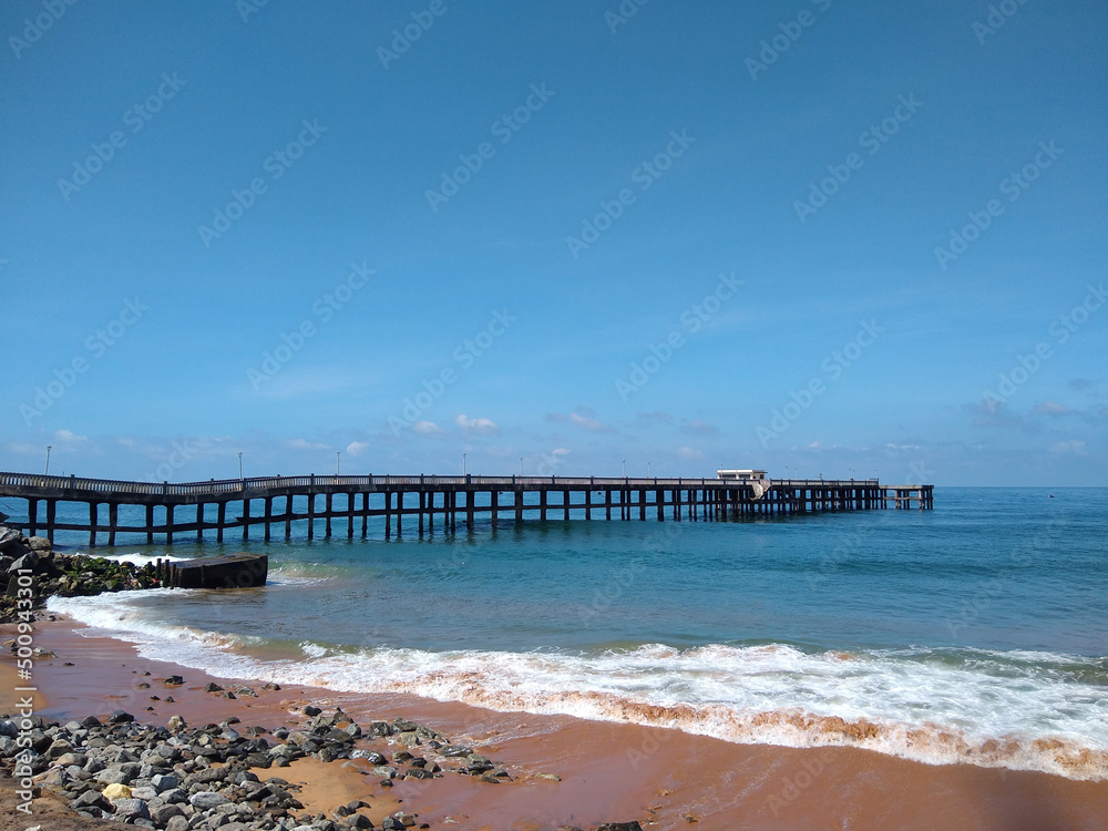 Valiyathura sea bridge, Thiruvananthapuram, Kerala, seascape view, blue sky background