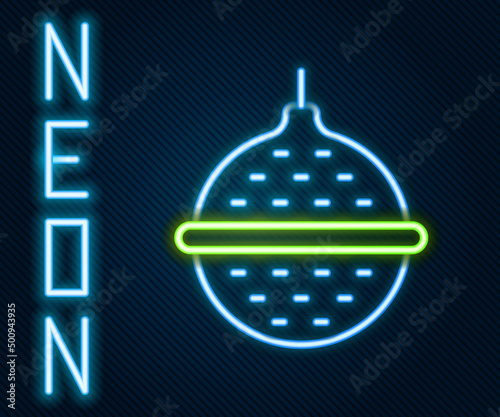 Glowing neon line Ball tea strainer icon isolated on black background. Colorful outline concept. Vector