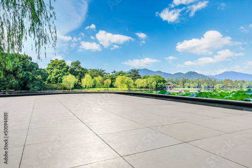 Empty square platform and beautiful lake and forest with mountain natural landscape in Hangzhou, China.