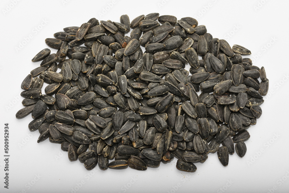 Roasted salted black sunflower seed background Roasted salted black sunflower seed background