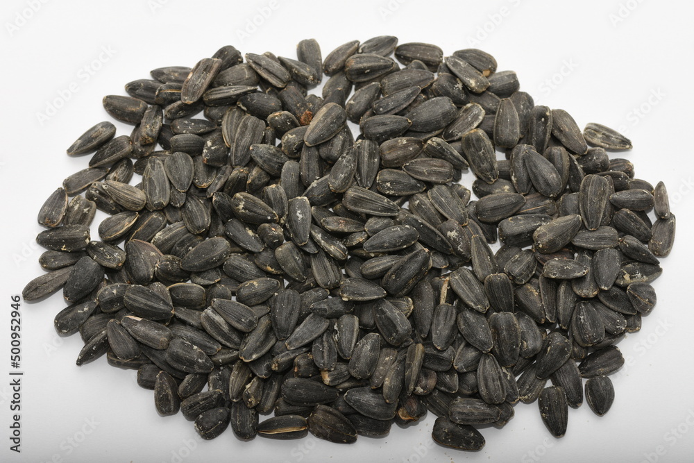 Roasted salted black sunflower seed background Roasted salted black sunflower seed background