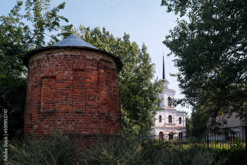 View of medieval tower and Spasa Vsemilostivogo church on sunny summer day. Vyazma, Smolensk Oblast, Russia. photo