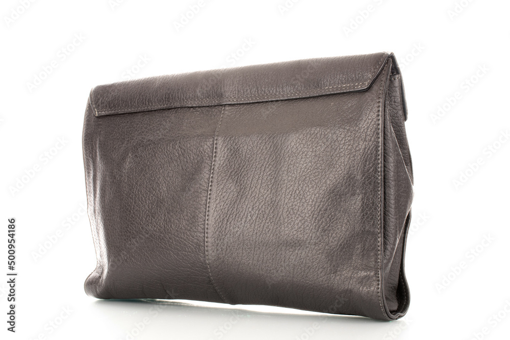One handbag made of artificial leather, close-up, isolated on a white background. One handbag made of artificial leather, close-up, isolated on a white background.