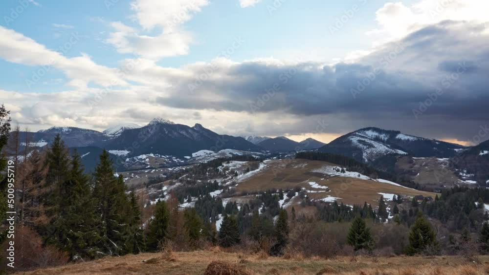 The sun's rays shine through the clouds and illuminate the landscape,cloudy weather before evening. The sun's rays shine through the clouds and illuminate the landscape,cloudy weather before evening.