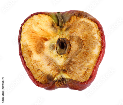 The spoiled apple is isolated on a white background. Full clipping path.