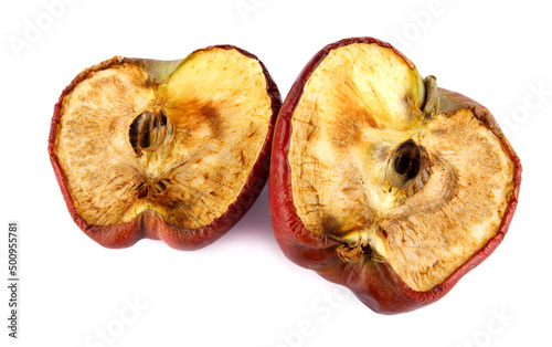 Fotografie Halved rotten apple is isolated against a white background