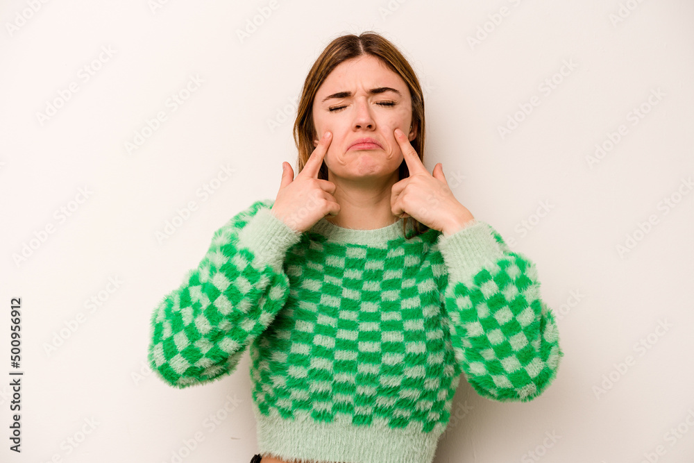 Young caucasian woman isolated on white background crying, unhappy with something, agony and confusion concept. Young caucasian woman isolated on white background crying, unhappy with something, agony and confusion concept.