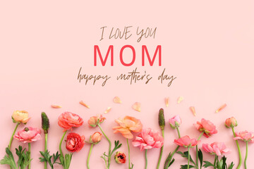 mother's day concept with pink flowers over pastel background