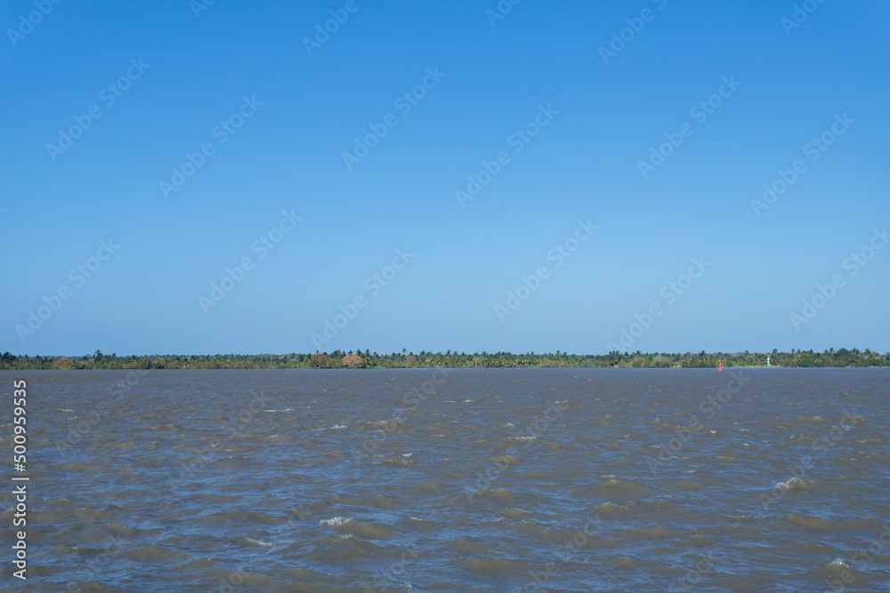 Natural landscape with a view of the Magdalena River and blue sky.