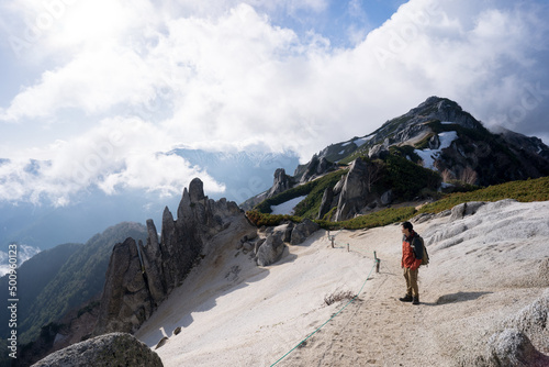 A lone hiker on the Peak of Mount Tsubakuro, Nagano, Japan.