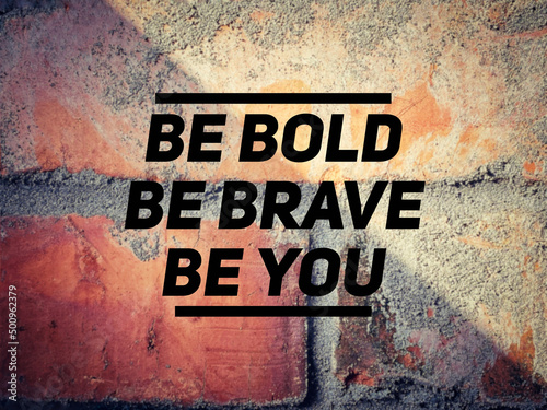 Be bold be brave be you text background. Inspirational motivational quote.