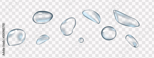 Realistic water drops on a transparent background. Vector