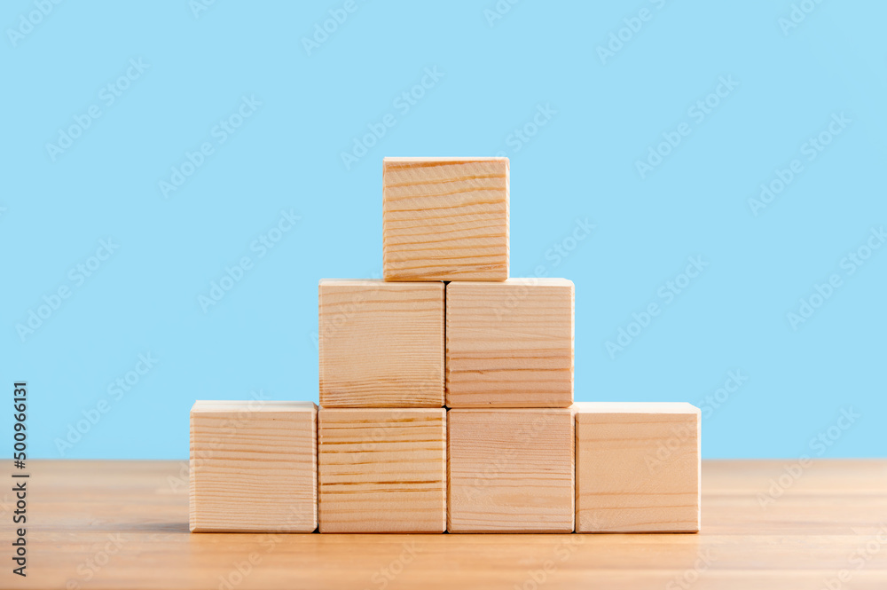 Blank wooden block cubes on a blue background for your text. free space for business concept template and banner.. Blank wooden block cubes on a blue background for your text. free space for business concept template and banner..