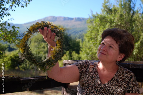 Woman made flower wraith in nature for health and happiness