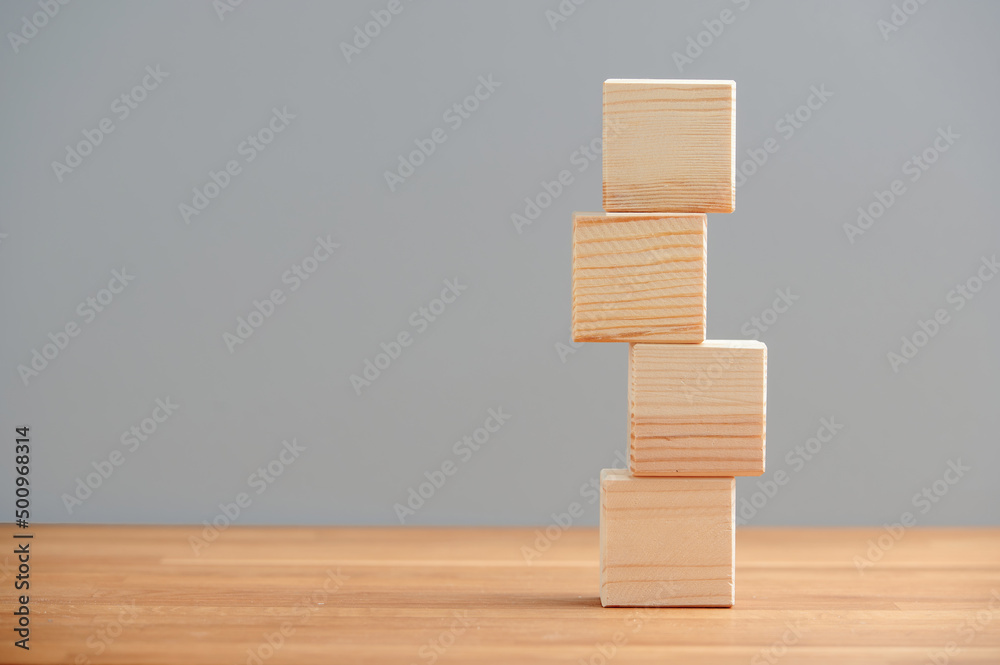 Blank wooden block cubes on a gray background for your text and advertisement. Free space for business concept template and banner.. Blank wooden block cubes on a gray background for your text and advertisement. Free space for business concept template and banner..