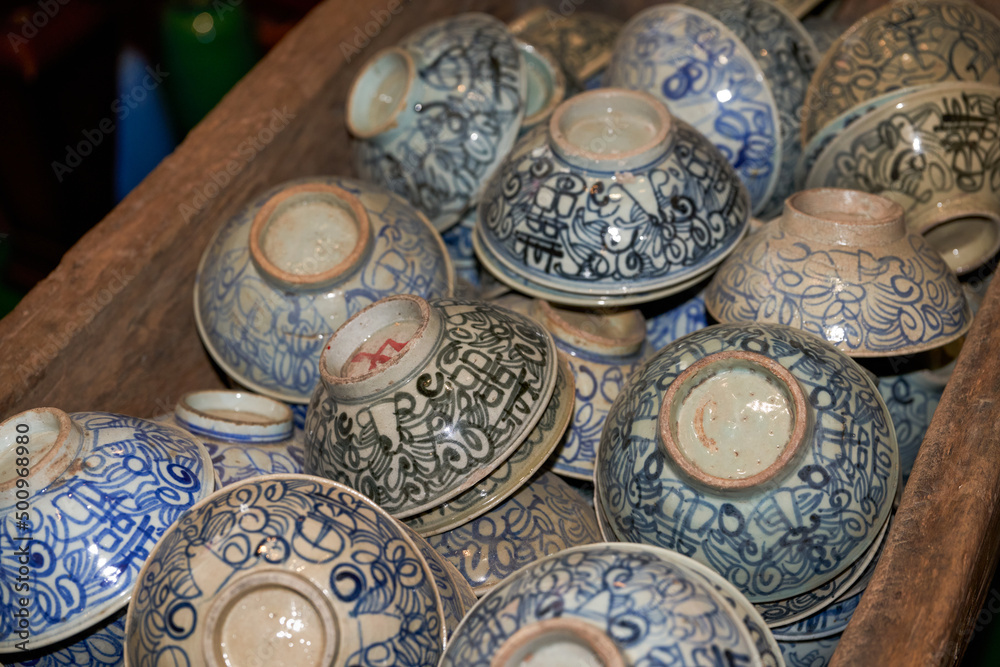 Pile of ceramic rice bowls and tea bowls close-up