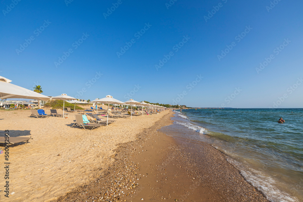 Beautiful view of people swimming in Mediterranean sea. Greece. Nea Potidea. Europe. Beautiful view of people swimming in Mediterranean sea. Greece. Nea Potidea. Europe.