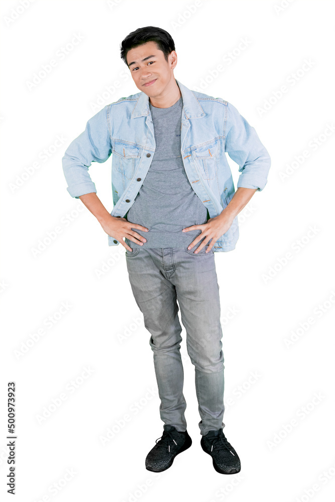 Fototapeta premium Teenage boy smiling at the camera on studio