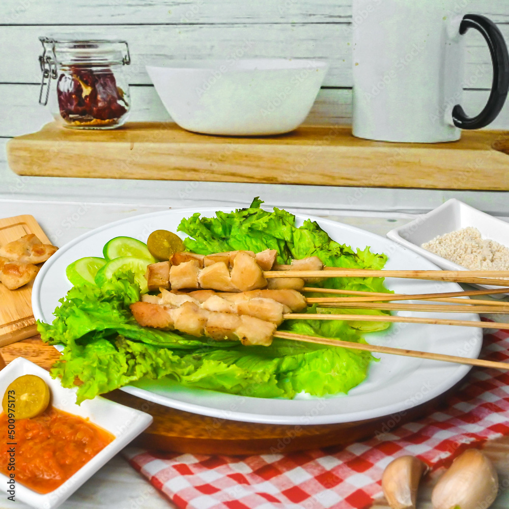Taichan satay is a traditional food from Jakarta consisting of grilled chicken satay without soy sauce and peanut sauce