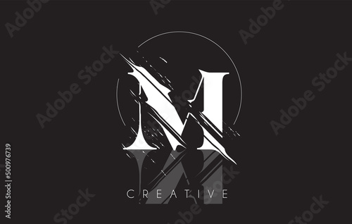 White M Letter Logo with Vintage Grundge Drawing Design. Destroyed Cutted Letter Icon Vector. photo