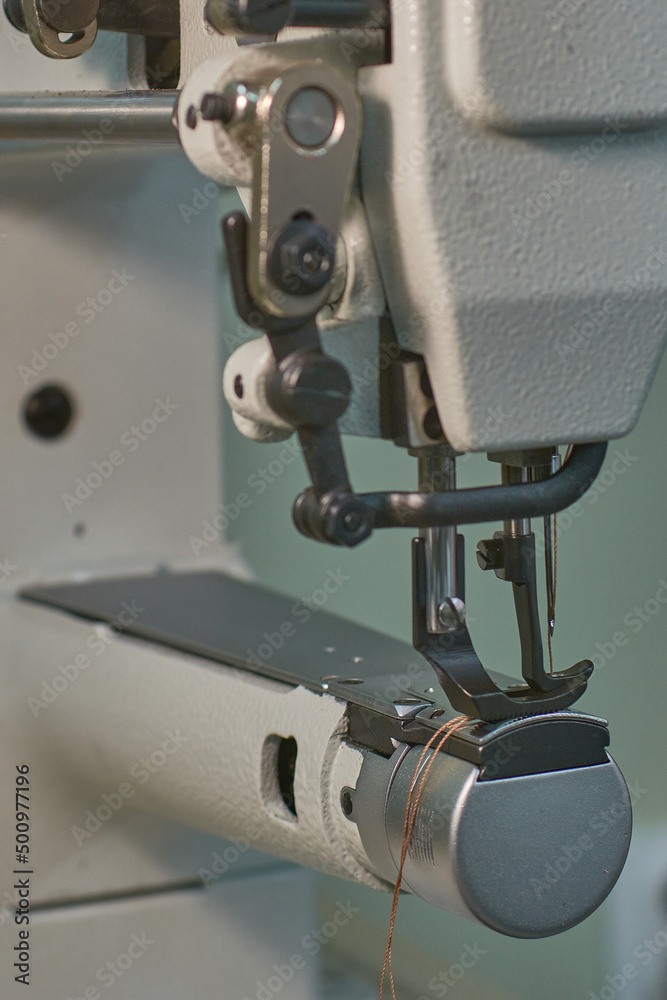 Fototapeta premium Sewing machine for watering heavy materials