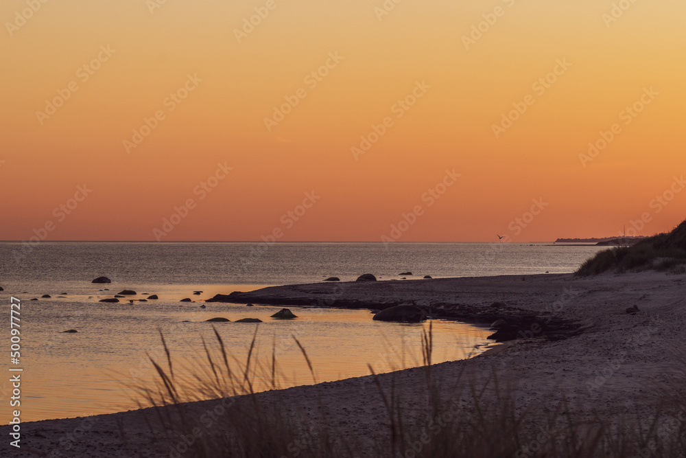 Obraz premium Sunset at the beach