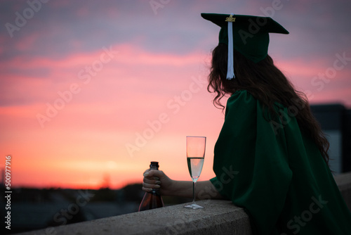 Graduate Celebrating at Sunset photo