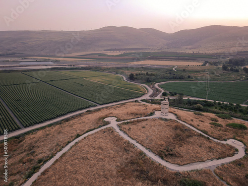 Aerial view of Tel Shukha Nahal Kibbutzim,  topped with three-storey concrete tower built in 1939 to provide protection for Kibbutz Nir David. Spring Valley Park HaMaayanot near Beit Shean photo