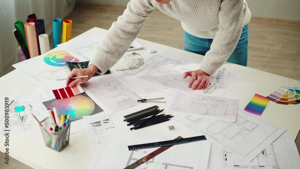 Architect designer workplace top view. Professional engineer choosing color palette, interior creator working with house project, blueprint plan, drafting building.