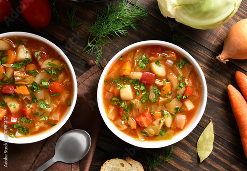 Cabbage soup in bowl photo