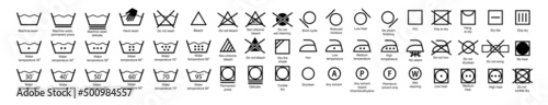 Laundry icons. Garment care instructions on labels, machine wash or hand wash signs. Collection of symbols of water temperature, ironing and drying, types of textiles and fabrics.Vector