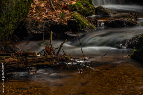 Cerveny creek with Cerveny waterfall in Jizerske mountains in spring morning