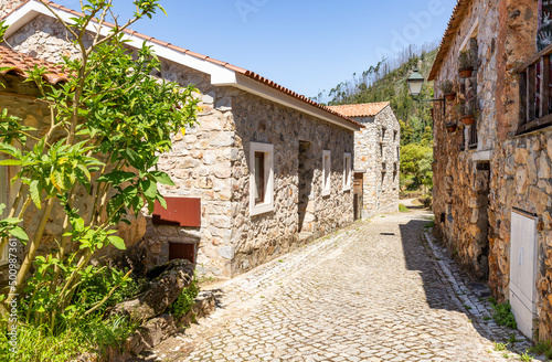 a cobbled street with traditional houses at Casal de São Simão Schist village (Aguda), Figueiró dos Vinhos, district of Leiria, Beira Litoral, Portugal